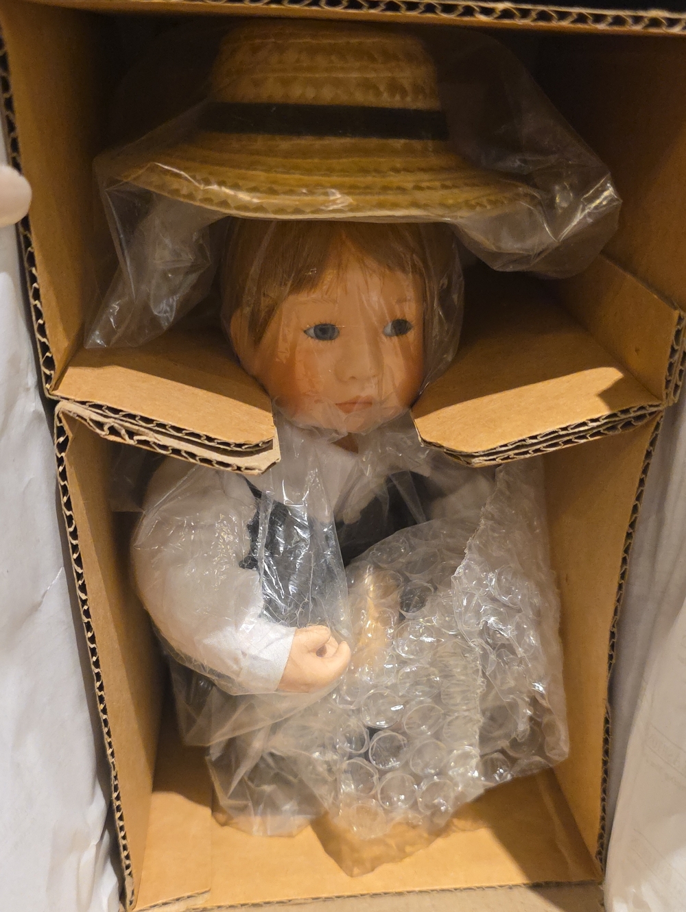 Porcelain Collector Doll with Yellow Straw Hat and White Outfit